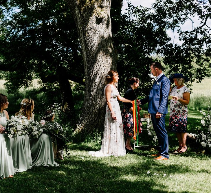 Bride In Floral Dress By Stephanie Allin Festival Wedding With Food Trucks &amp; Outdoor Ceremony With Geo Dome Tent Baya Hire Epic Love Story Photography