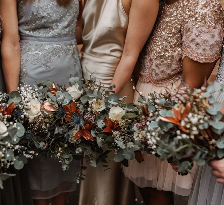 Winter Wedding Bouquets // London Fields Brewery Wedding With Bride In Bespoke Dress By Katrine Mikklesen And Images From Taylor Hughes Photography