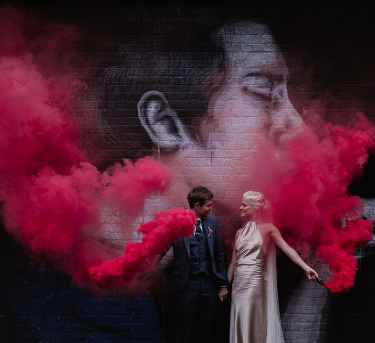 Red Smoke Bombs For Wedding // London Fields Brewery Wedding With Bride In Bespoke Dress By Katrine Mikklesen And Images From Taylor Hughes Photography