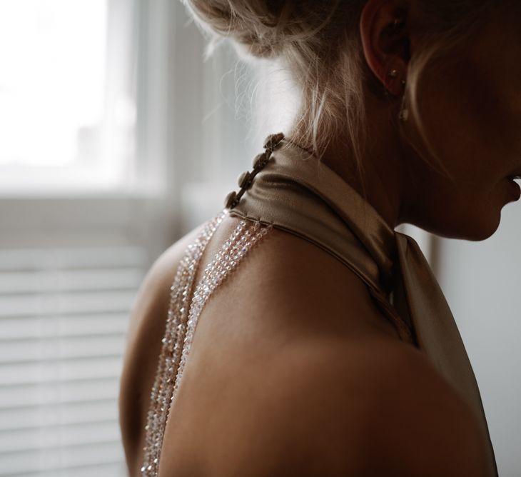 Bride In Halterneck Wedding Dress // Christmas London Fields Brewery Wedding With Bride In Bespoke Dress By Katrine Mikklesen And Images From Taylor Hughes Photography