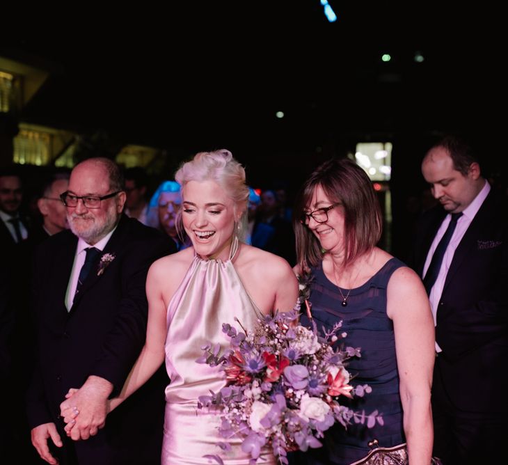 Bride In Halterneck Wedding Dress //  Christmas London Fields Brewery Wedding With Bride In Bespoke Dress By Katrine Mikklesen And Images From Taylor Hughes Photography