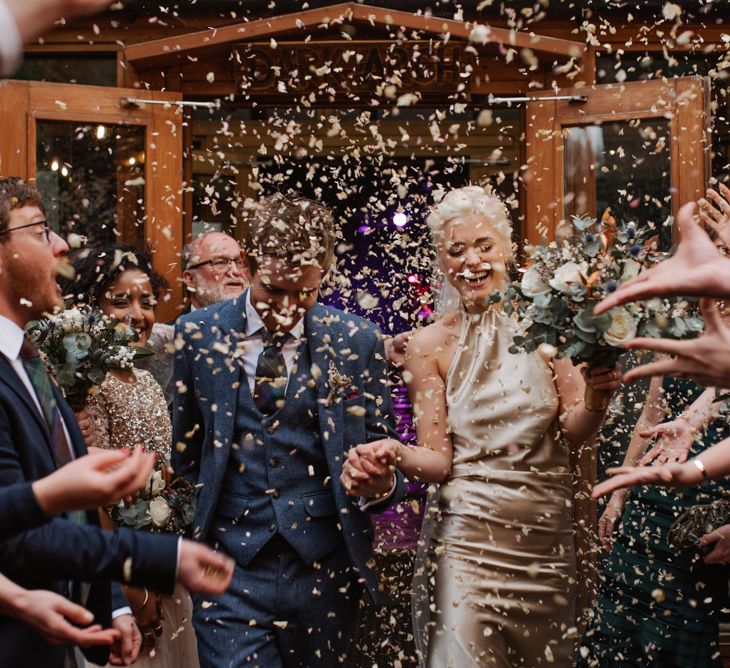 Confetti Moment // Christmas London Fields Brewery Wedding With Bride In Bespoke Dress By Katrine Mikklesen And Images From Taylor Hughes Photography