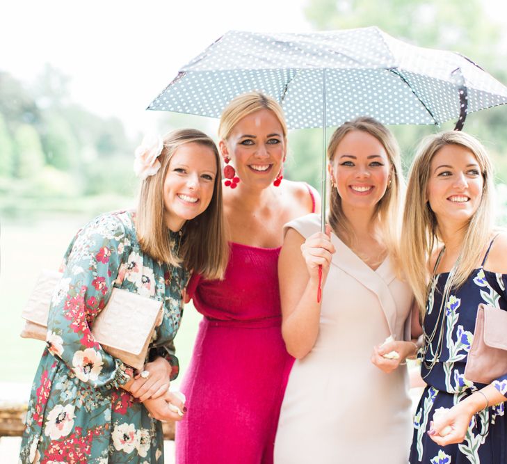 Beautiful Female Wedding Guests in Floral Dresses