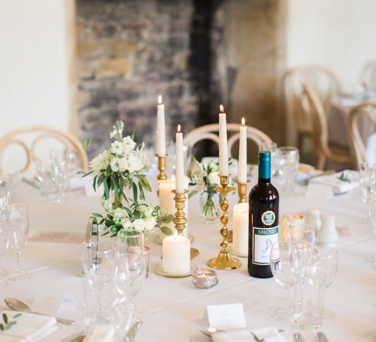 Gold Candlesticks and Taper Candles Centrepiece