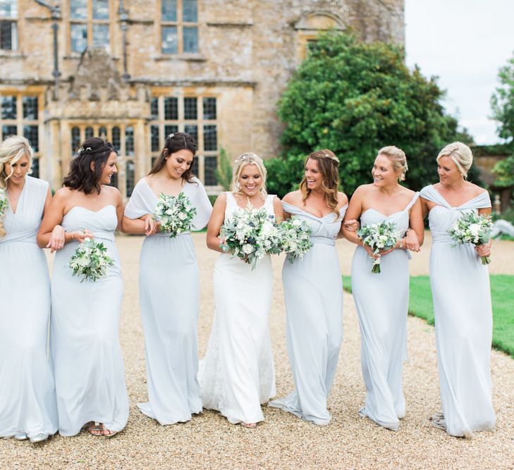 Bridal Party Walking Along The Wedding Venue Path