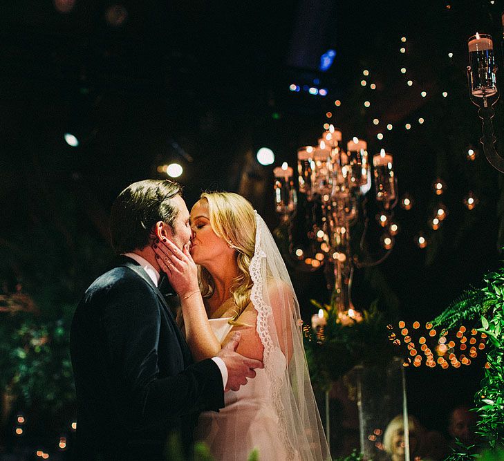 Wedding Ceremony | Bride in Caroline Castigliano Gown | Groom in Tuxedo | Botanical Black Tie Wedding at Rivington Hall Barn with Acrylic Candelabras &amp; Louis Ghost Chairs | Lawson Photography | Ever After Videos