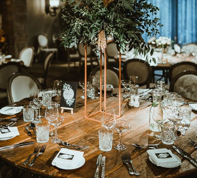 Winter reception with cosy styling and foliage table decor