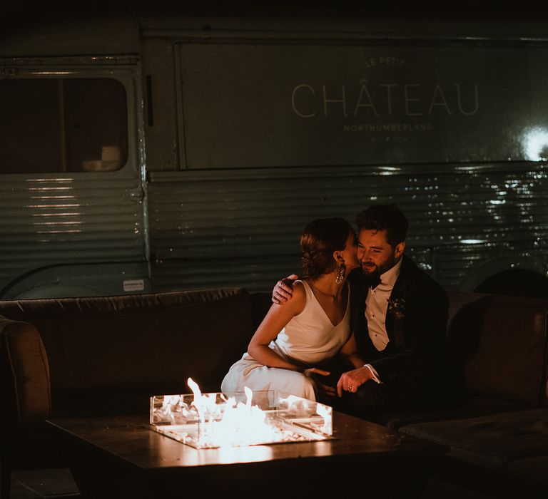 Bride and groom steal a moment at winter wedding