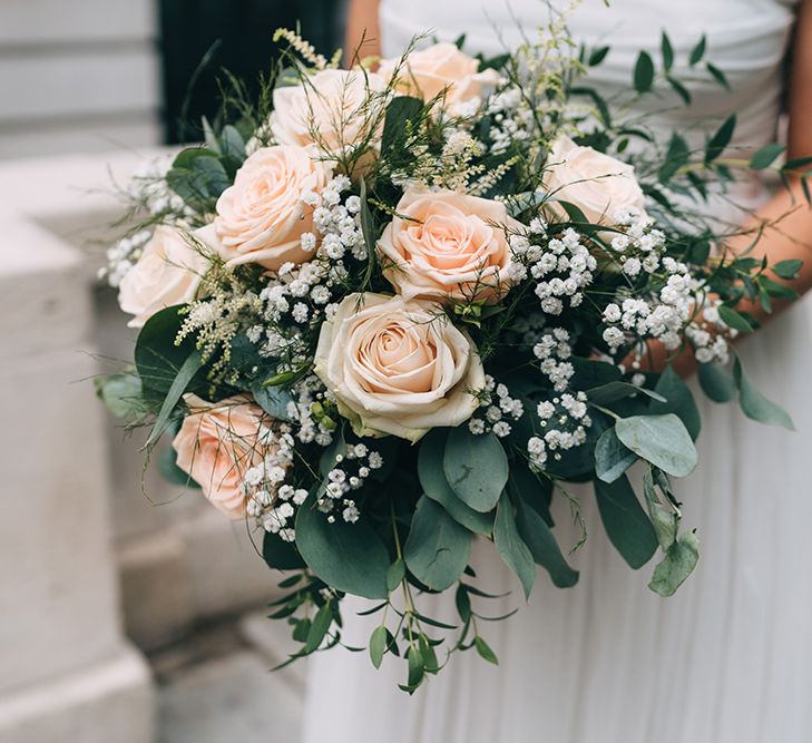 Classic bridal bouquet with pink roses, eucalyptus and gypsophila