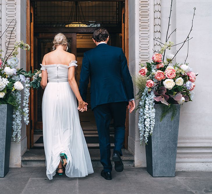 Pink white and blue wedding flower arrangements at Intimate elopement