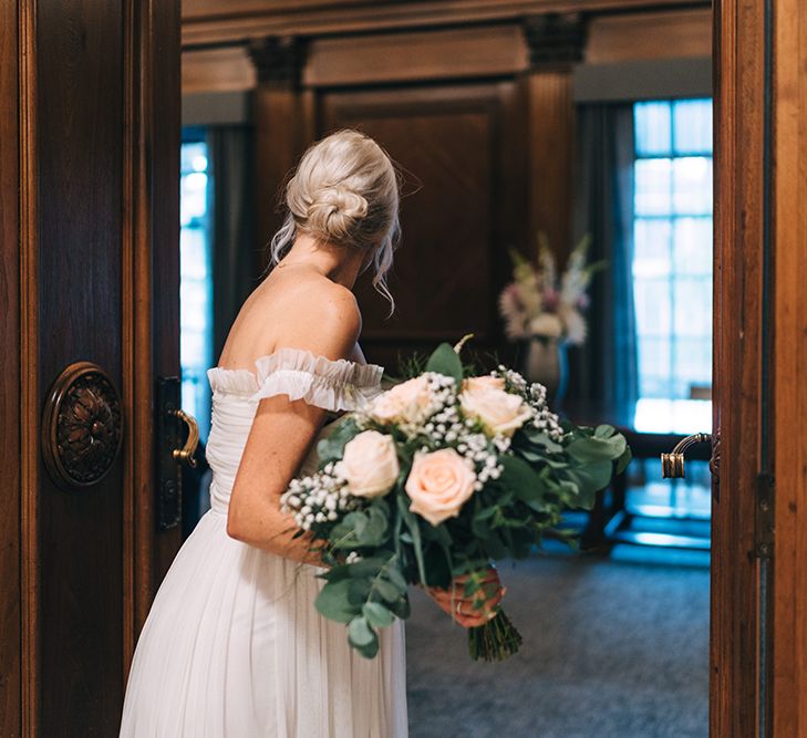 Bride with messy bun, bridal updo