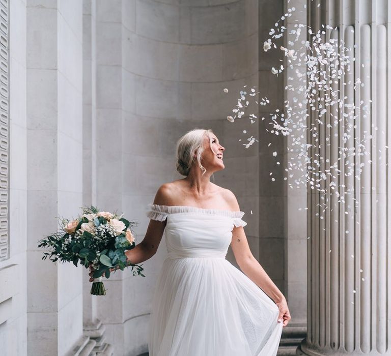 Beautiful pregnant bride in maternity wedding dress