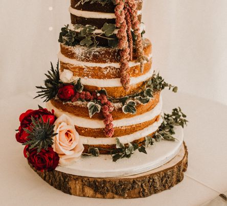 Semi Naked Wedding Cake With Fresh Flowers // Glamorous Iscoyd Park Wedding With Burgundy, Navy And Ivory Colour Scheme With Artistic And Alternative Images From Carla Blain Photography