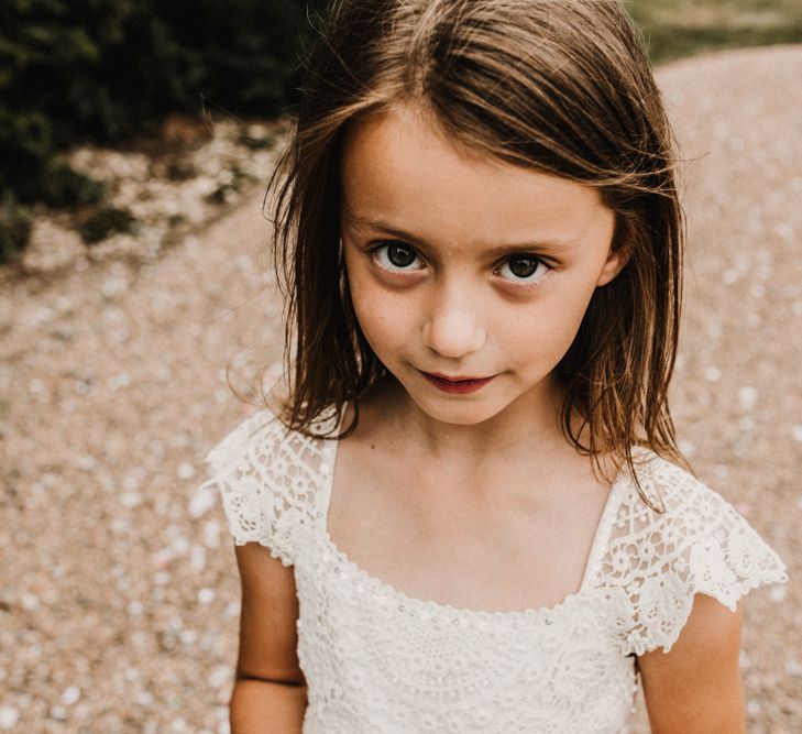 Flower Girl In White Lace Dress // Glamorous Iscoyd Park Wedding With Burgundy, Navy And Ivory Colour Scheme With Artistic And Alternative Images From Carla Blain Photography