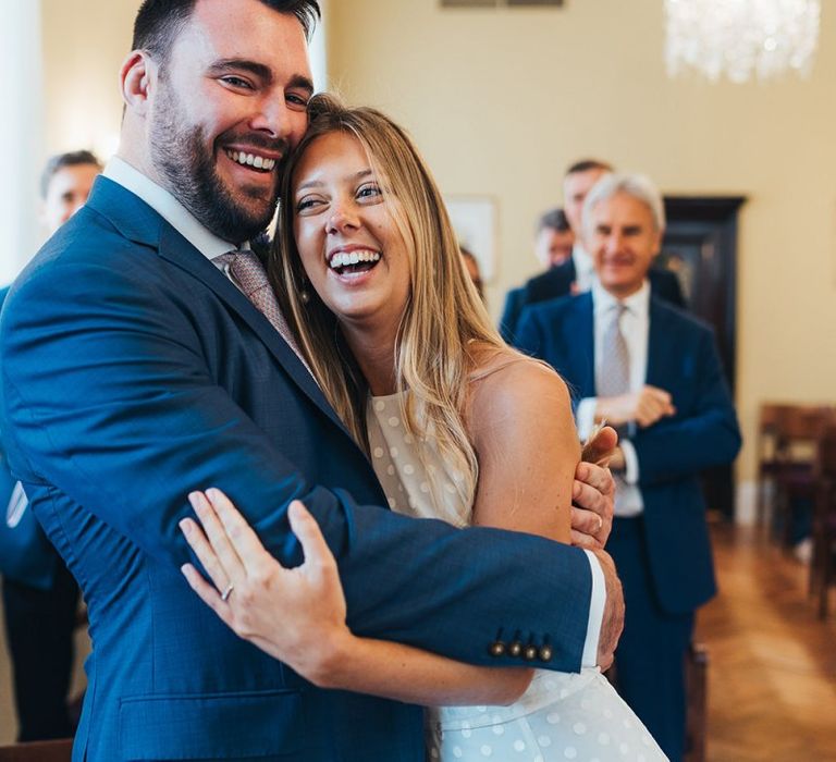 Bride And Groom Laugh During Ceremony