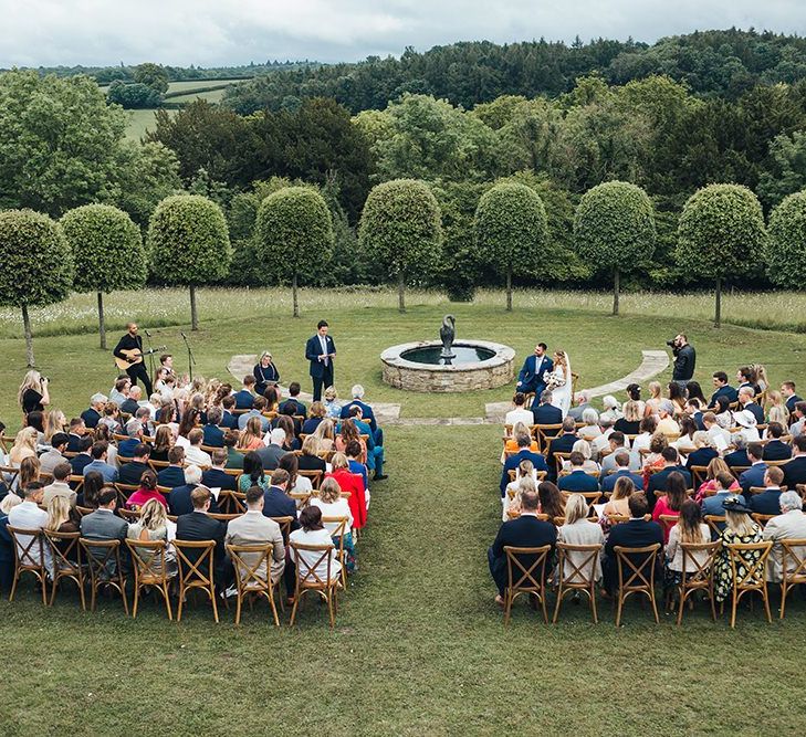 Outdoor Wedding Ceremony at The Brides Parents Home in Surrey