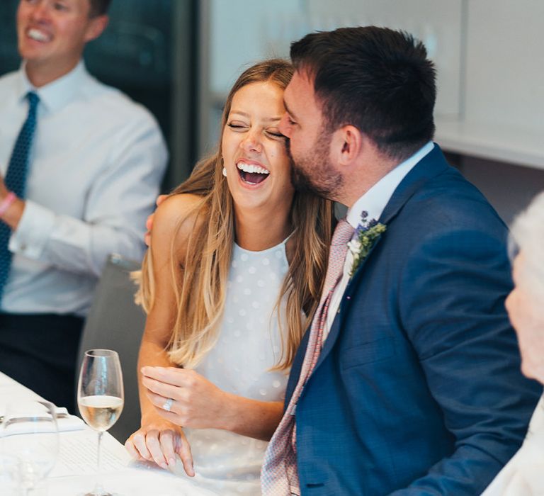 Bride and Groom Enjoy Wedding Lunch