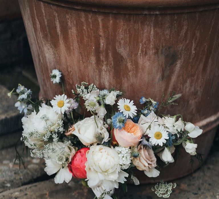 Delicate Wedding Bouquet with Peonies and Wildflowers Tied with Ribbon