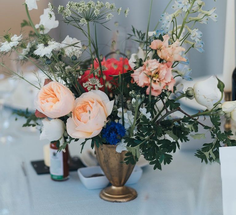 Bright Wedding Flowers in Gold Vessel as Table Centrepiece