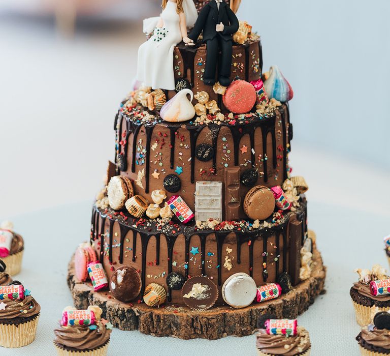 Chocolate Drip Wedding Cake Decorated with Macaroons