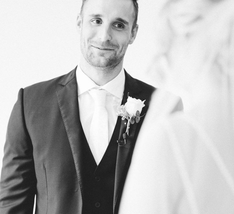 Groom at the Altar Looking Lovingly at His Bride