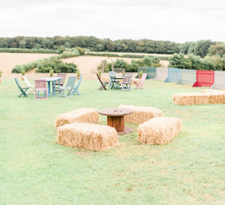 Outdoor Seating Area with Hay Bales and Benches