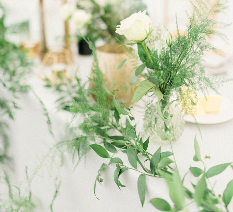 Foliage and White Flower Table Decorations