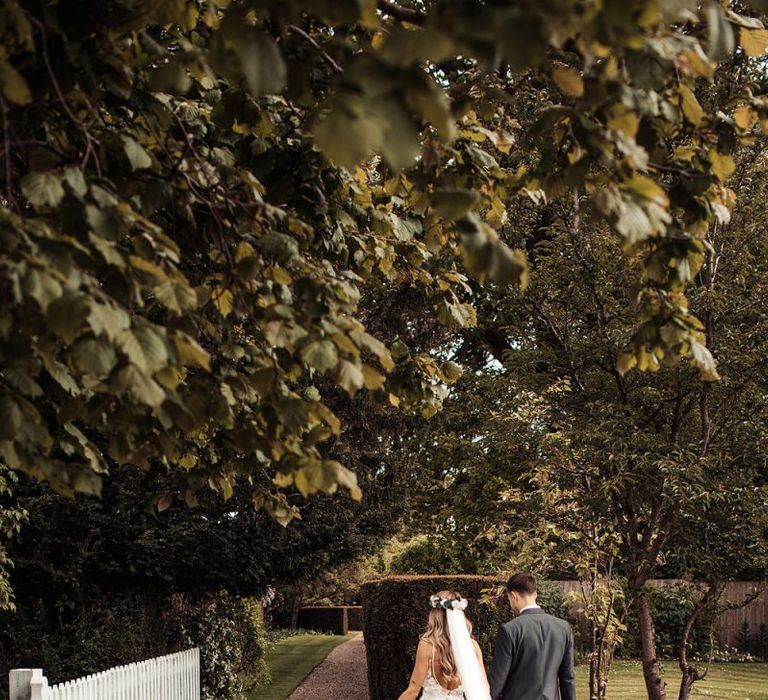 Bride and Groom Walk Through Blake Hall Venue Grounds