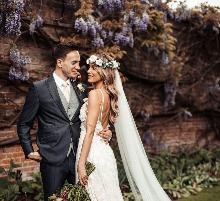 Beautiful Bride and Groom With Bouquet and Flower Crown