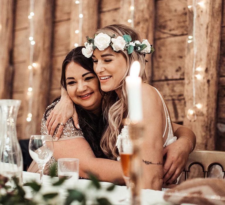 Bride Embraces Bridesmaid During Wedding Speeches