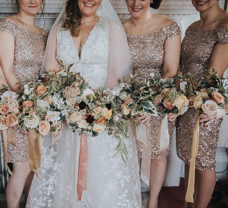 Bridal Party In Gold Bridesmaid Dresses With Bouquets