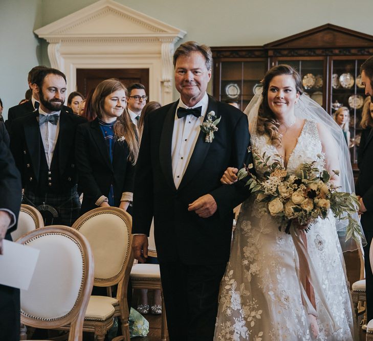 Bride Walking Down The Aisle With Father at Oxfordshire Wedding Venue