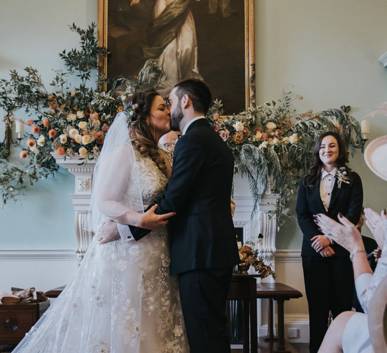 Bride and Groom Kiss After Exchanging Vows