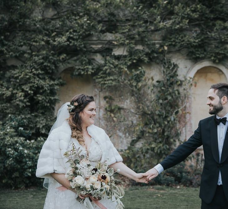 Bride And Groom Portrait Holding Hands at Kirtlington Park Wedding Venue