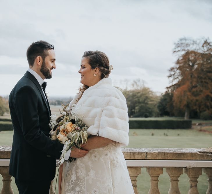 Bride Wears Faux Fur Cover Up For Winter Wedding