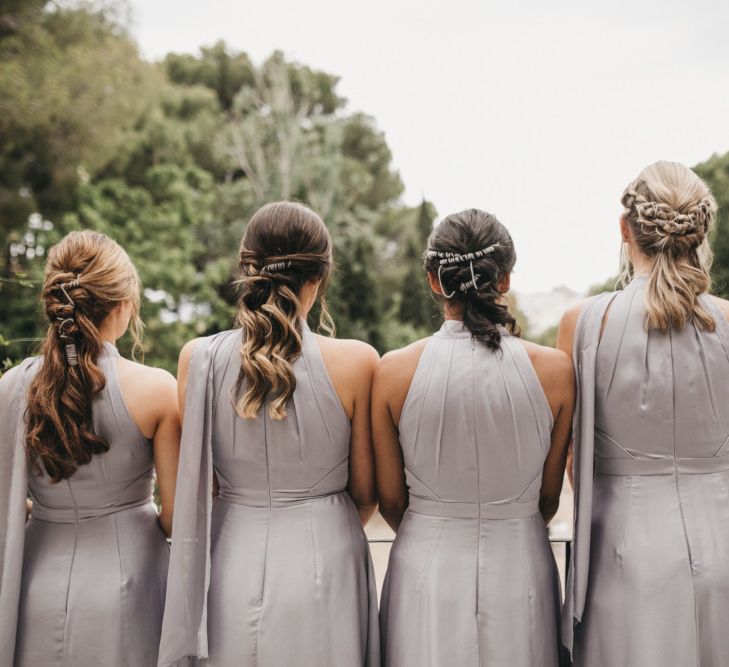 Bridesmaids in Grey Halterneck Dresses and Twisted Half Up Half Down Hairstyles