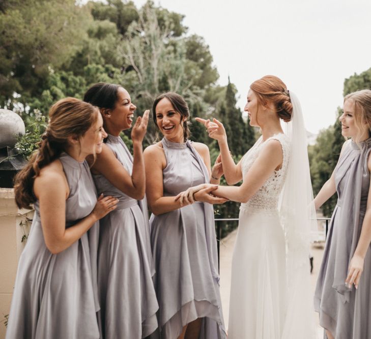 Bride and Bridesmaids Laughing on the Wedding Morning