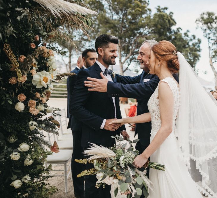 Father of the Bride Giving Away His Daughter at the Altar