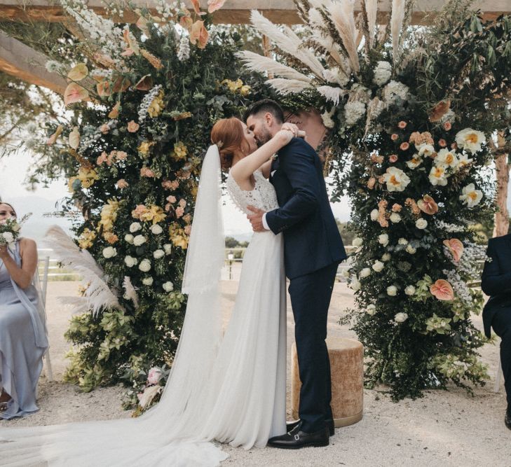 Floral Arch with Peach Flowers, Foliage and Pampas Grass