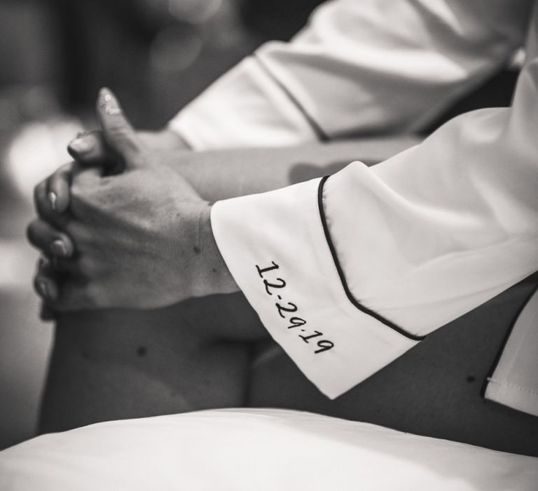 Embroidered wedding date on the brides getting ready robes