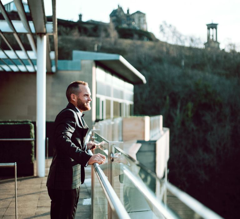 Groom in tartan suit for Edinburgh elopement