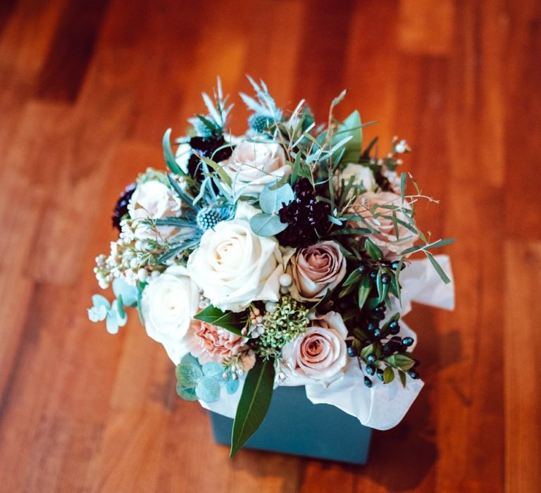 Wedding bouquet with heather and roses