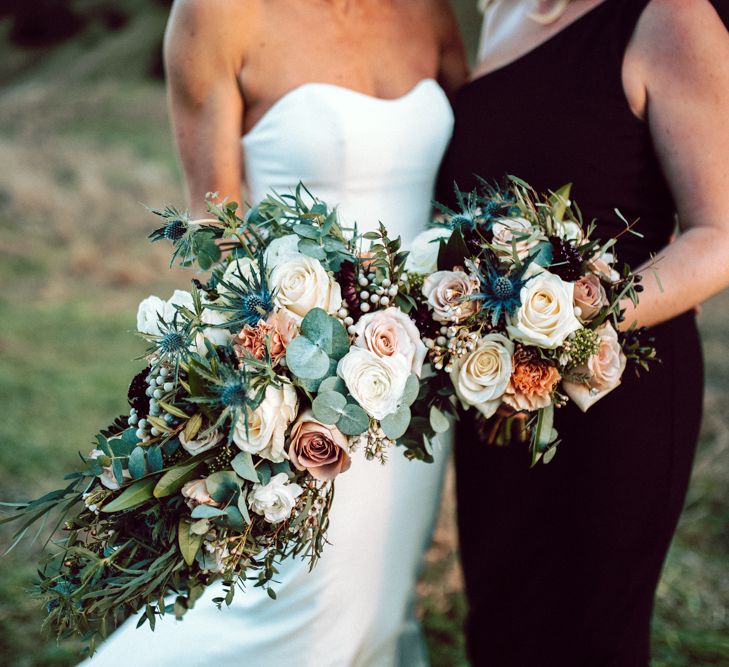 Winter wedding bouquet with roses, eucalyptus and heather