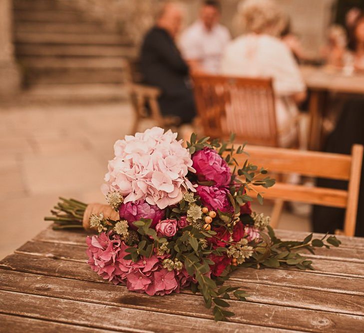 Pink Bridal Bouquet with Hydrangeas, Roses and Foliage featured on escape to the chateau