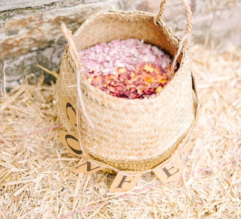 Confetti Petals in Wicker Basket | Colourful Paper Cranes &amp; Sunflower Wedding Décor in Rustic Barn | Sarah-Jane Ethan Photography