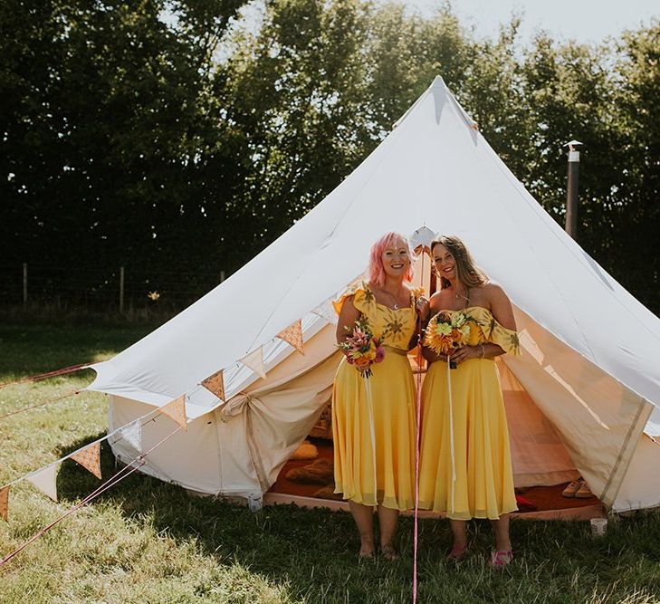 Canary yellow bridesmaid dresses with bright bouquets