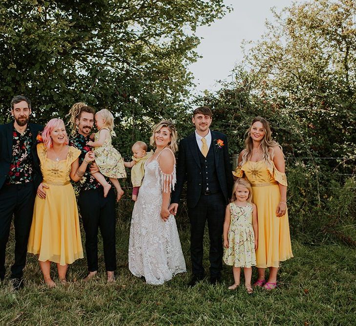 Wedding party with canary yellow bridesmaid dresses