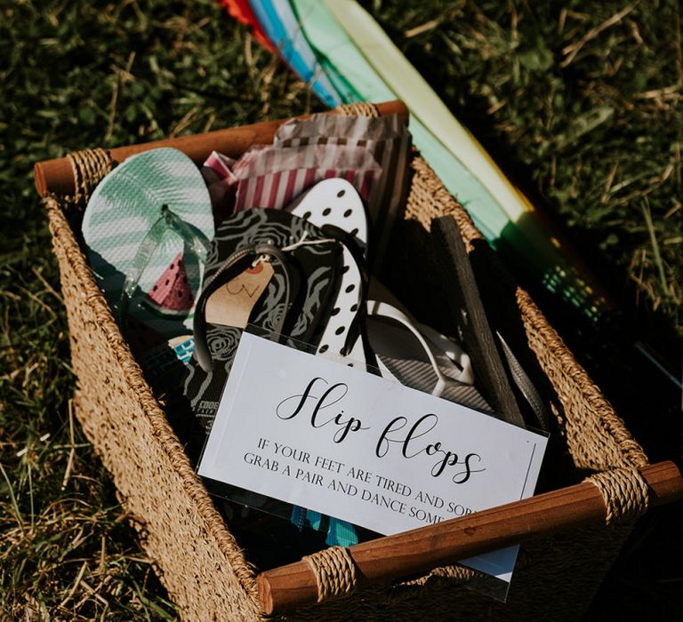 Flip flop basket for guests at festival style wedding