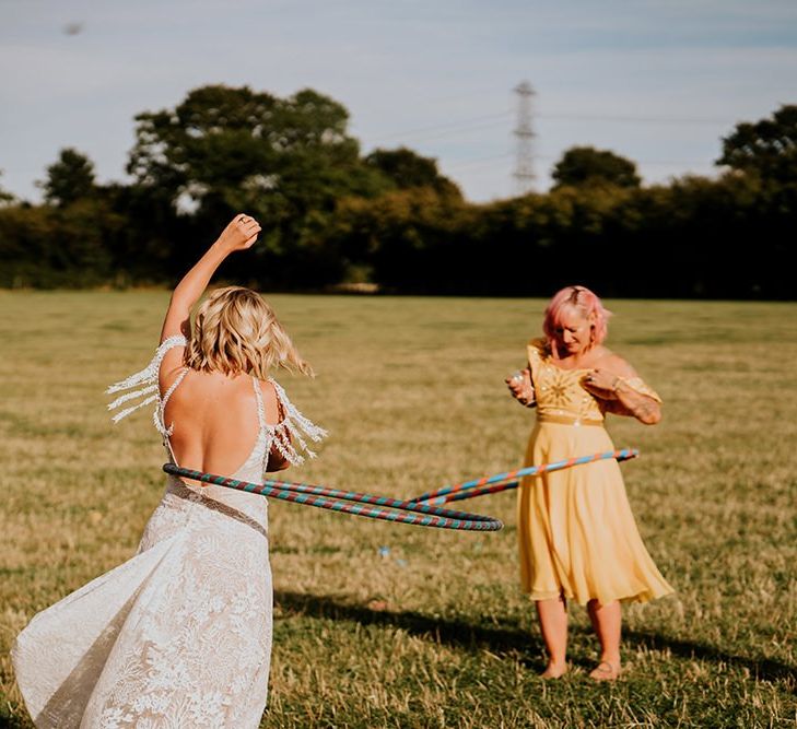 Canary yellow bridesmaid dresses and garden games at wedding