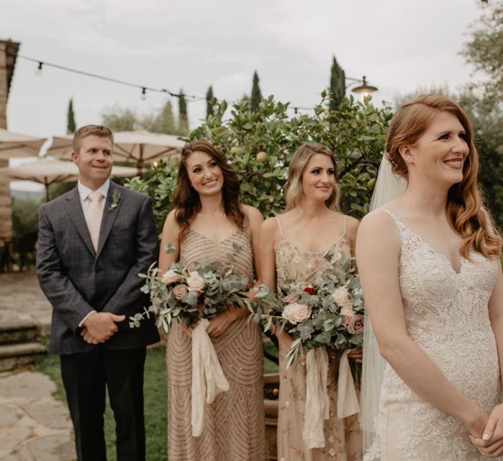 Outdoor Wedding Ceremony with Bridesmaids Entrance in Adrianna Papell Dresses